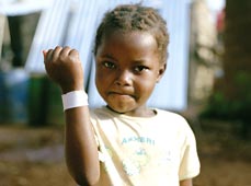 Girl with homemade Make Poverty History wristband
